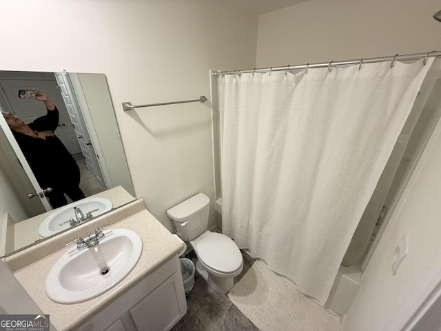 bathroom featuring toilet, shower / bathtub combination with curtain, and vanity