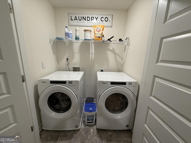 laundry room with laundry area and washing machine and clothes dryer