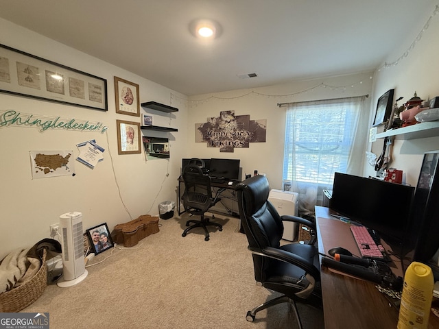 office featuring carpet floors and visible vents