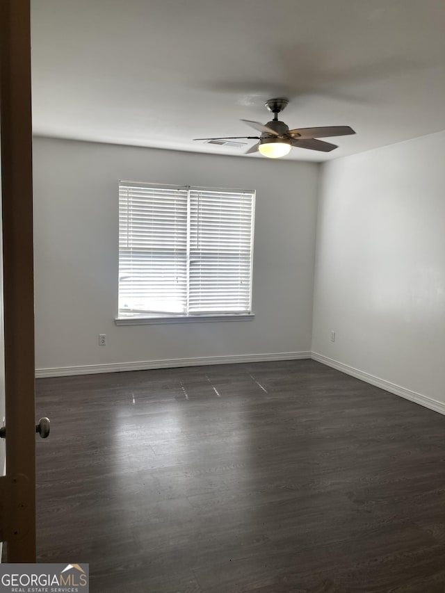 1047 Plantation Way NW, Kennesaw, GA 30144 - unfurnished room featuring ceiling fan, baseboards, and dark wood-style floors