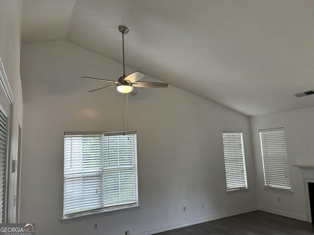 1047 Plantation Way NW, Kennesaw, GA 30144 - unfurnished room with ceiling fan, dark wood-type flooring, high vaulted ceiling, and baseboards