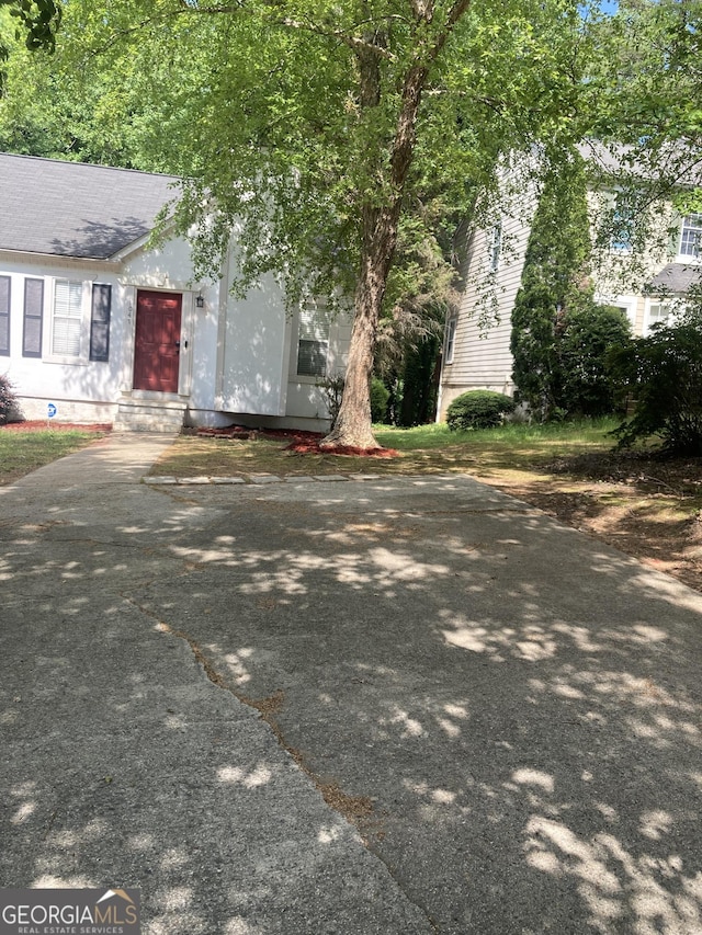 1047 Plantation Way NW, Kennesaw, GA 30144 - view of front of home with a shingled roof
