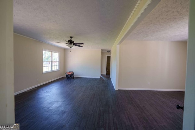 unfurnished living room featuring a ceiling fan, a textured ceiling, dark wood finished floors, and baseboards