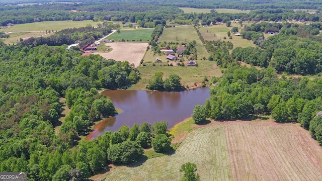 aerial view featuring a water view and a rural view