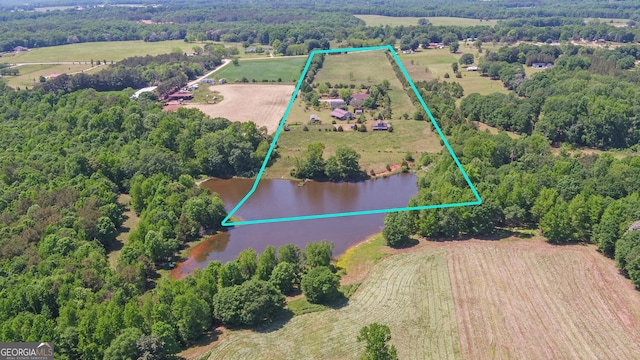 aerial view with a water view and a rural view