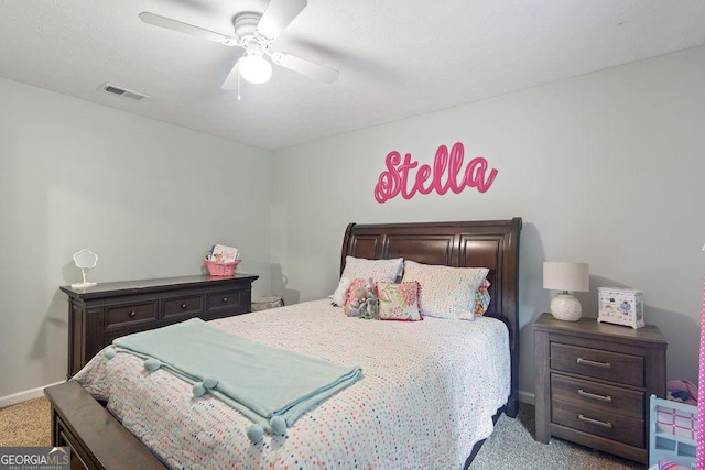 bedroom featuring baseboards, carpet, a ceiling fan, and visible vents