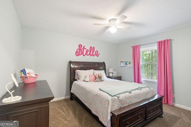 bedroom featuring baseboards, ceiling fan, and carpet