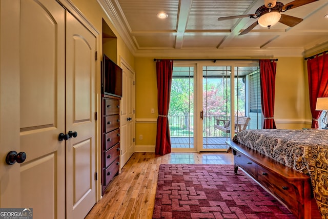 bedroom featuring beamed ceiling, ornamental molding, light wood finished floors, access to outside, and coffered ceiling
