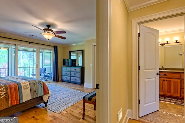 bedroom featuring visible vents, ornamental molding, and access to exterior