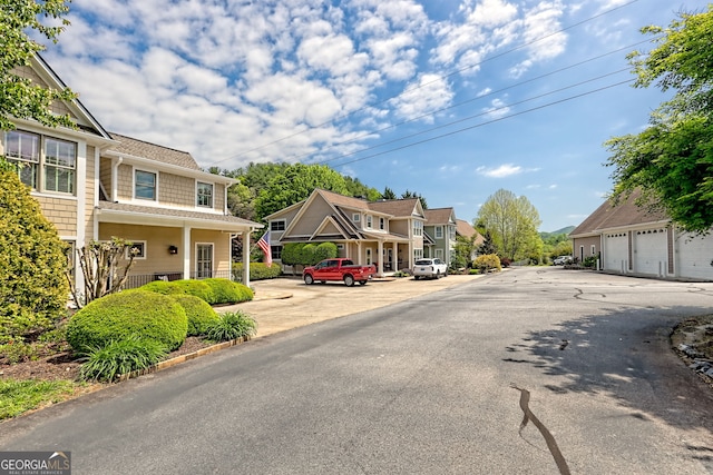 view of road with a residential view