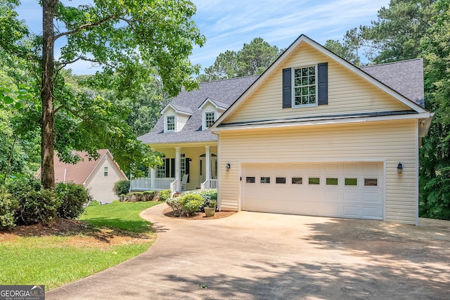 147 S Pine Cove Dr, Lagrange, GA 30240 - traditional home featuring a porch, concrete driveway, roof with shingles, and a garage