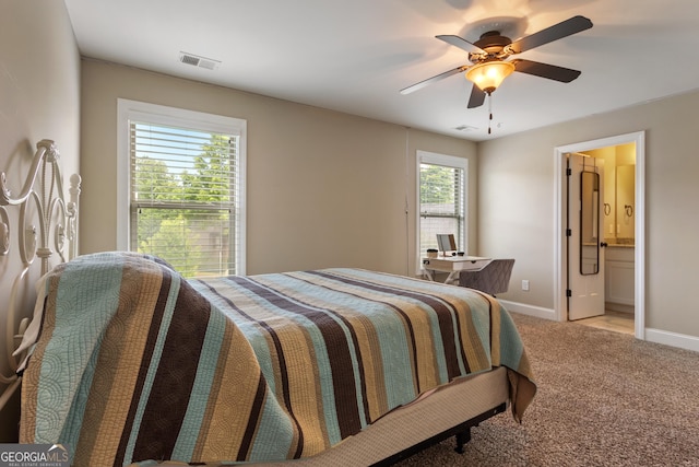 bedroom with baseboards, a ceiling fan, carpet flooring, and visible vents