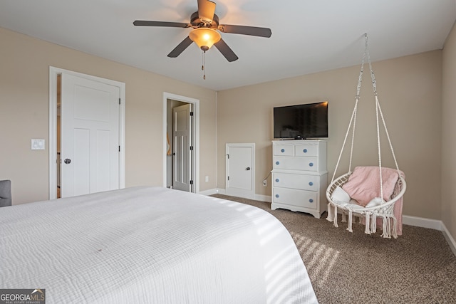 bedroom with baseboards, carpet, and ceiling fan