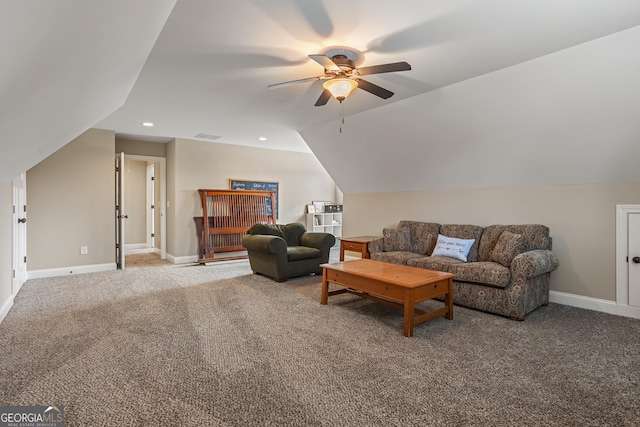 living room with carpet floors, a ceiling fan, baseboards, and vaulted ceiling