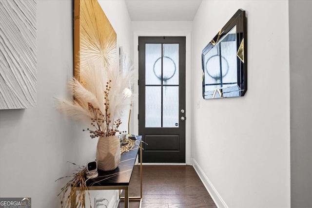2669 Caruso Way, Atlanta, GA 30339 - doorway with baseboards and wood finished floors