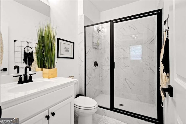 2669 Caruso Way, Atlanta, GA 30339 - full bathroom with toilet, a marble finish shower, marble finish floor, and vanity