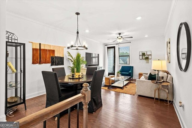 2669 Caruso Way, Atlanta, GA 30339 - dining area featuring baseboards, recessed lighting, dark wood finished floors, and crown molding