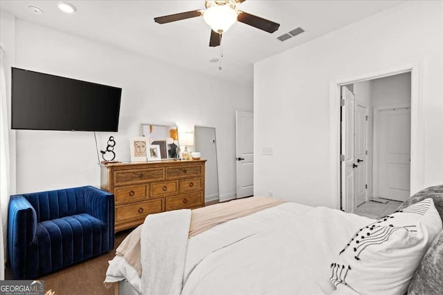 2669 Caruso Way, Atlanta, GA 30339 - bedroom featuring a ceiling fan, recessed lighting, wood finished floors, and visible vents