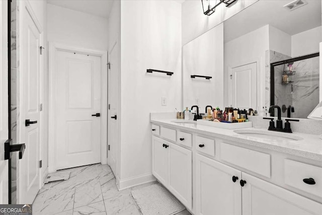 2669 Caruso Way, Atlanta, GA 30339 - full bathroom featuring visible vents, a sink, marble finish floor, and a shower stall