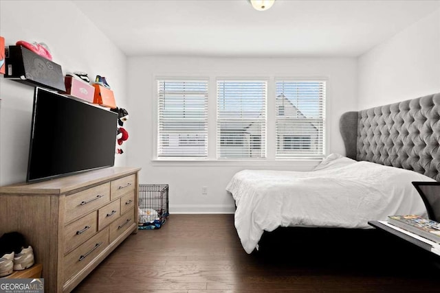 2669 Caruso Way, Atlanta, GA 30339 - bedroom featuring baseboards and dark wood-type flooring