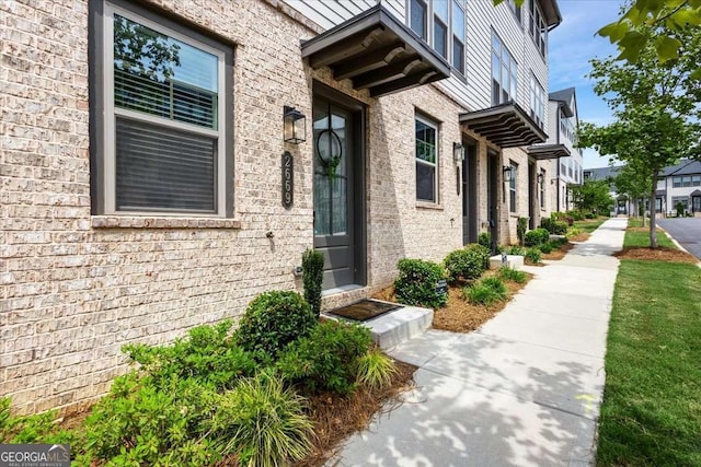 2669 Caruso Way, Atlanta, GA 30339 - entrance to property featuring brick siding and a residential view