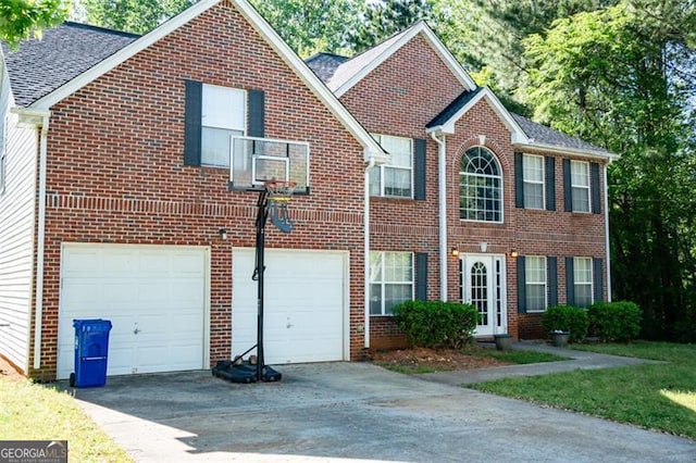 4041 Smithfield Trl, Ellenwood, GA 30294 - colonial inspired home featuring roof with shingles, an attached garage, concrete driveway, and brick siding
