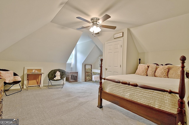 carpeted bedroom featuring a ceiling fan, baseboards, and lofted ceiling