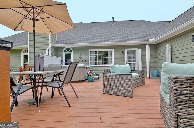 deck with outdoor dining space