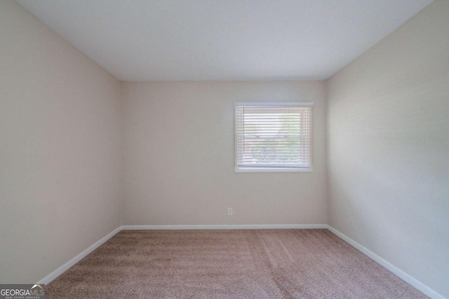 3497 Glensford Dr, Decatur, GA 30032 - empty room featuring carpet floors and baseboards