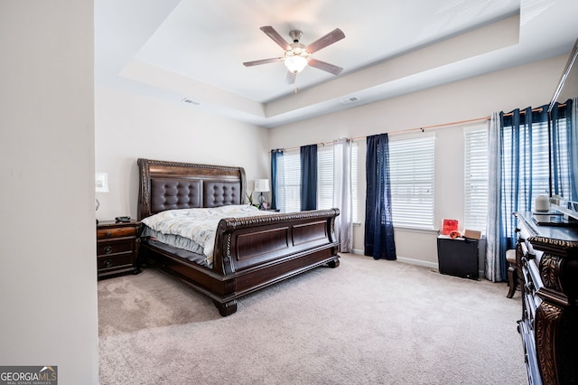 406 Crescent Woode Dr, Dallas, GA 30157 - bedroom with ceiling fan, carpet, baseboards, a tray ceiling, and visible vents