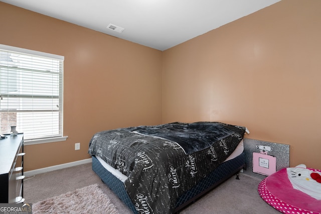 406 Crescent Woode Dr, Dallas, GA 30157 - carpeted bedroom featuring baseboards, visible vents, and multiple windows