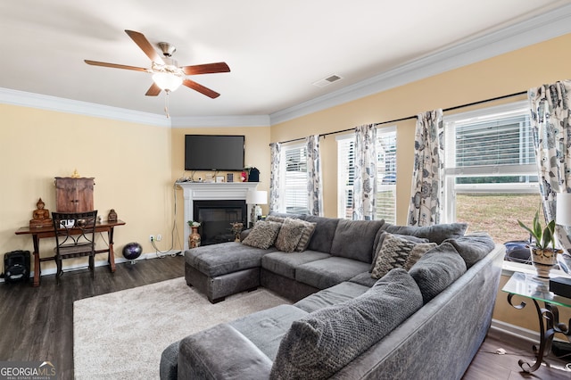 406 Crescent Woode Dr, Dallas, GA 30157 - living room featuring ornamental molding, a ceiling fan, wood finished floors, and visible vents