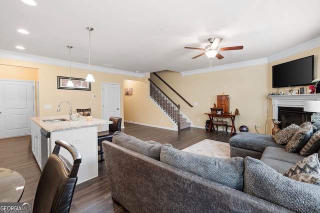 406 Crescent Woode Dr, Dallas, GA 30157 - living area featuring stairway, dark wood-style flooring, a ceiling fan, and a glass covered fireplace