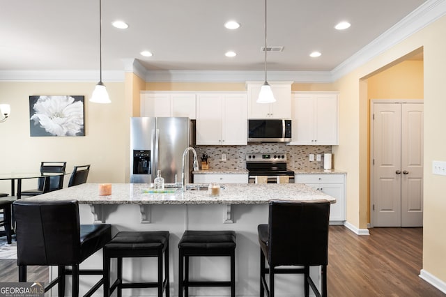 406 Crescent Woode Dr, Dallas, GA 30157 - kitchen with crown molding, appliances with stainless steel finishes, dark wood finished floors, tasteful backsplash, and visible vents