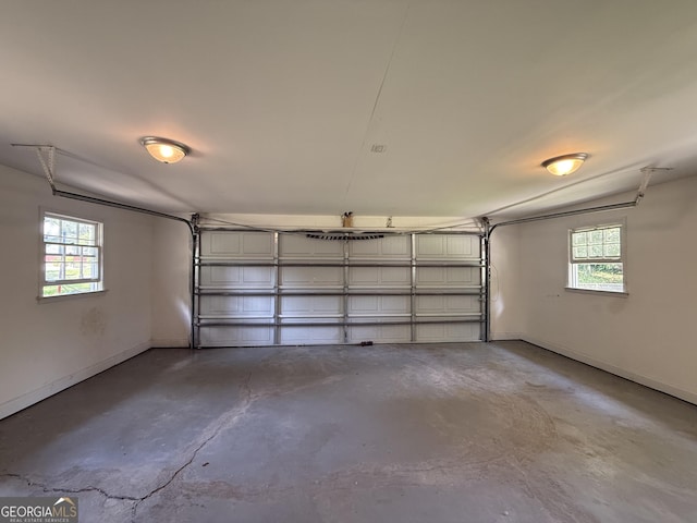 garage featuring baseboards