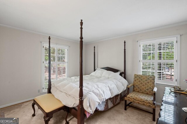 681 Hampton Pl SW, Marietta, GA 30064 - carpeted bedroom with crown molding, baseboards, and multiple windows