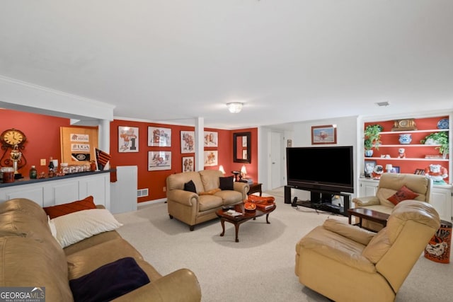681 Hampton Pl SW, Marietta, GA 30064 - carpeted living room featuring built in shelves and visible vents