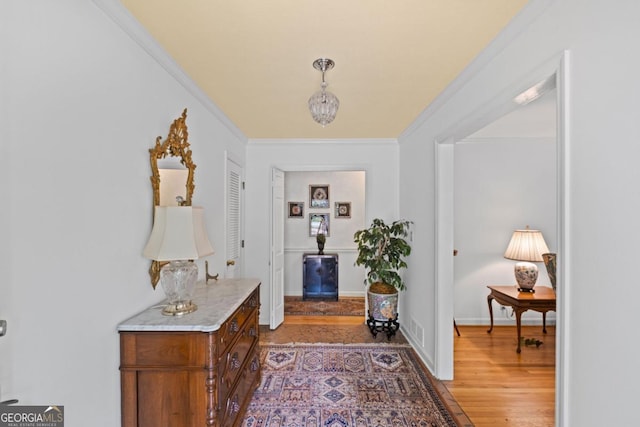 681 Hampton Pl SW, Marietta, GA 30064 - hall with visible vents, ornamental molding, and light wood finished floors