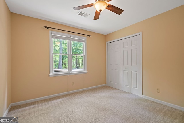5755 Hendrix Rd, Cumming, GA 30040 - unfurnished bedroom with carpet flooring, baseboards, a closet, and ceiling fan