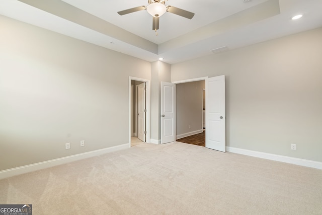 unfurnished bedroom with carpet floors, baseboards, a ceiling fan, and recessed lighting