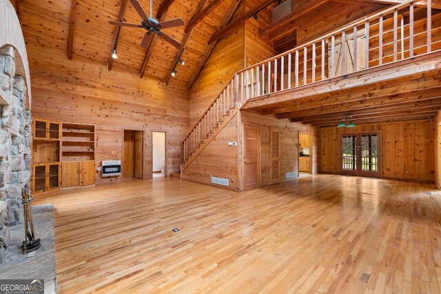 966 Wahoo Creek Rd, Murrayville, GA 30564 - unfurnished living room featuring wood ceiling, a ceiling fan, high vaulted ceiling, wood-type flooring, and heating unit