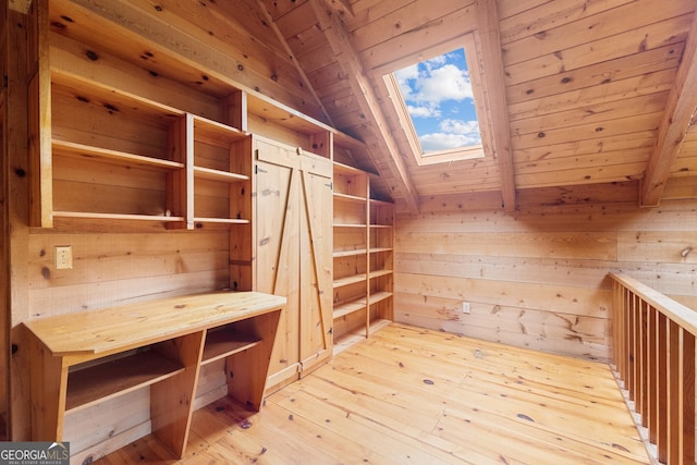966 Wahoo Creek Rd, Murrayville, GA 30564 - mudroom featuring vaulted ceiling with skylight, wood ceiling, wood walls, and light wood-type flooring