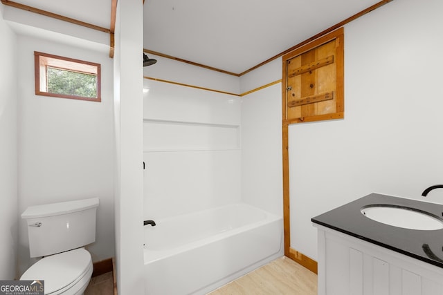 966 Wahoo Creek Rd, Murrayville, GA 30564 - bathroom with bathtub / shower combination, wood finished floors, vanity, baseboards, and toilet