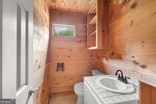 966 Wahoo Creek Rd, Murrayville, GA 30564 - bathroom with wooden walls, toilet, wood ceiling, and vanity