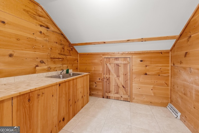 966 Wahoo Creek Rd, Murrayville, GA 30564 - interior space featuring visible vents, vaulted ceiling, a sink, light tile patterned floors, and wooden walls