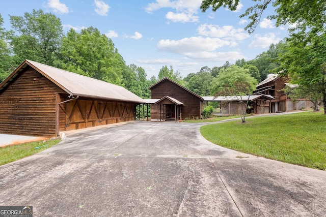 966 Wahoo Creek Rd, Murrayville, GA 30564 - view of front of house with concrete driveway and a front lawn