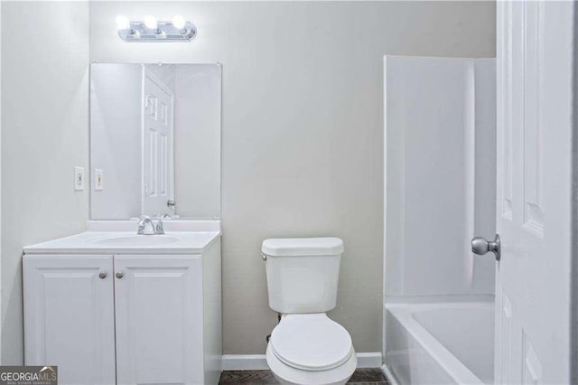 4872 Lewis Rd, Powder Springs, GA 30127 - bathroom with vanity, baseboards, and toilet