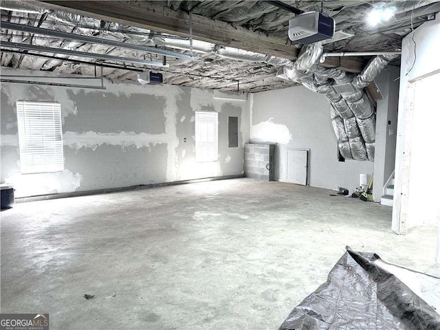 4872 Lewis Rd, Powder Springs, GA 30127 - garage featuring a garage door opener and electric panel