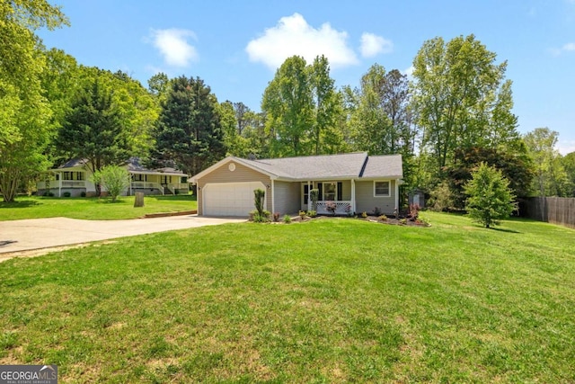 ranch-style home with covered porch, a front yard, a garage, fence, and concrete driveway