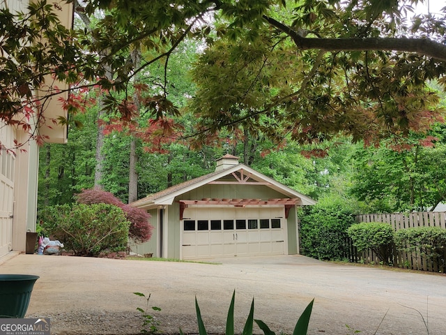 detached garage with fence